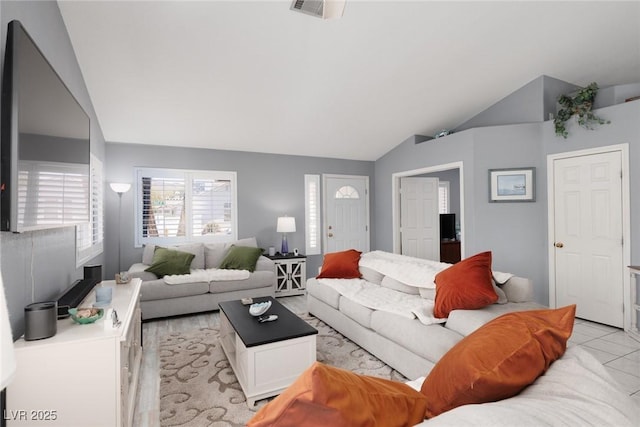 998 Hunters Run Dr, Henderson, NV 89002 - living area with vaulted ceiling and light tile patterned floors