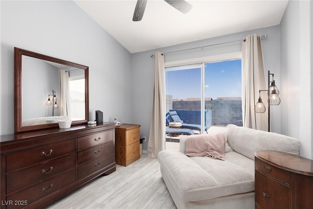998 Hunters Run Dr, Henderson, NV 89002 - living area with light wood finished floors, ceiling fan, and lofted ceiling