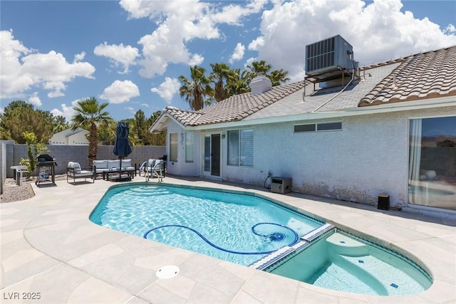 998 Hunters Run Dr, Henderson, NV 89002 - view of swimming pool with a patio area, a fenced backyard, outdoor lounge area, and a pool with connected hot tub