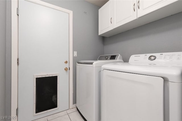 998 Hunters Run Dr, Henderson, NV 89002 - washroom with washing machine and clothes dryer, cabinet space, and light tile patterned floors