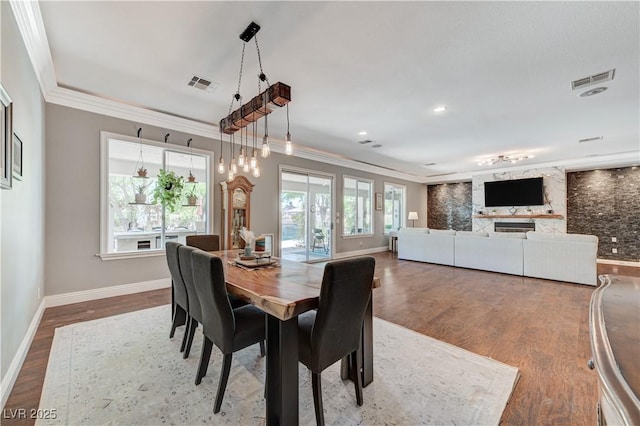 5913 Audria Falls Ave, Las Vegas, NV 89131 - dining room with ornamental molding, wood finished floors, and recessed lighting