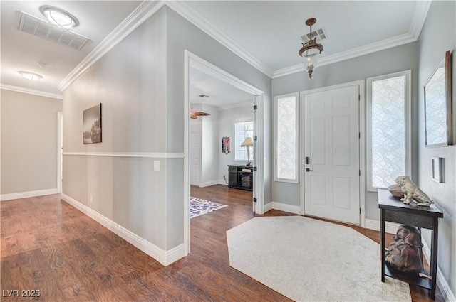 5913 Audria Falls Ave, Las Vegas, NV 89131 - entryway with dark wood-style flooring and crown molding