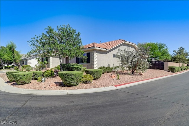 5913 Audria Falls Ave, Las Vegas, NV 89131 - view of front of home featuring stucco siding and a tile roof