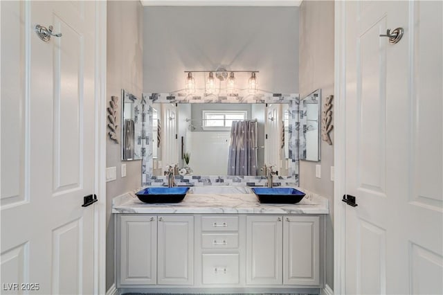 5913 Audria Falls Ave, Las Vegas, NV 89131 - full bathroom with double vanity and a shower