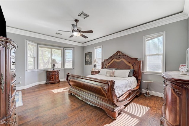 5913 Audria Falls Ave, Las Vegas, NV 89131 - bedroom featuring dark wood-style floors, multiple windows, ornamental molding, and a ceiling fan