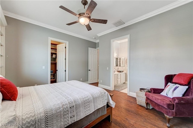 5913 Audria Falls Ave, Las Vegas, NV 89131 - bedroom featuring crown molding, wood finished floors, ceiling fan, and ensuite bath