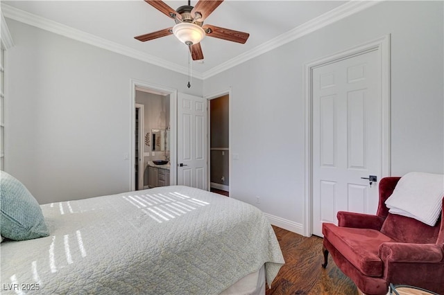 5913 Audria Falls Ave, Las Vegas, NV 89131 - bedroom with crown molding, dark wood-style floors, connected bathroom, and ceiling fan