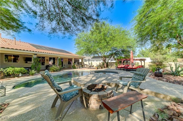 5913 Audria Falls Ave, Las Vegas, NV 89131 - view of patio featuring an outdoor pool, an outdoor fire pit, and an in-ground hot tub