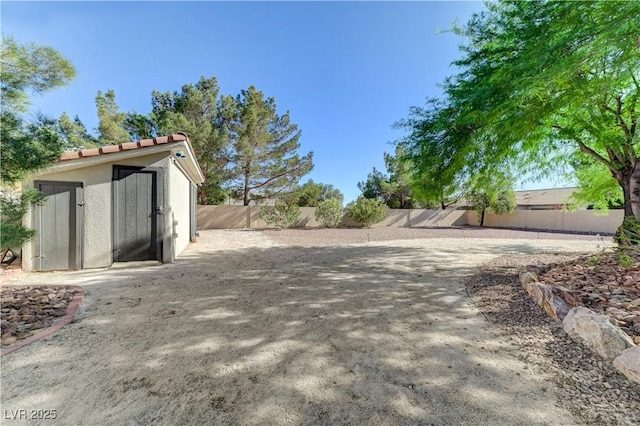 5913 Audria Falls Ave, Las Vegas, NV 89131 - fenced backyard featuring a shed