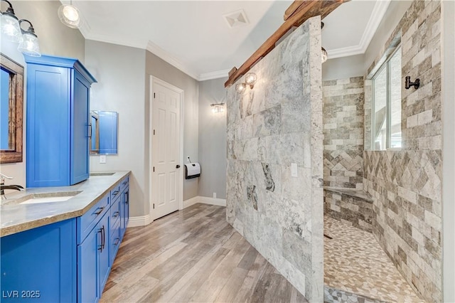 5913 Audria Falls Ave, Las Vegas, NV 89131 - full bathroom featuring vanity, wood finished floors, a walk in shower, and ornamental molding