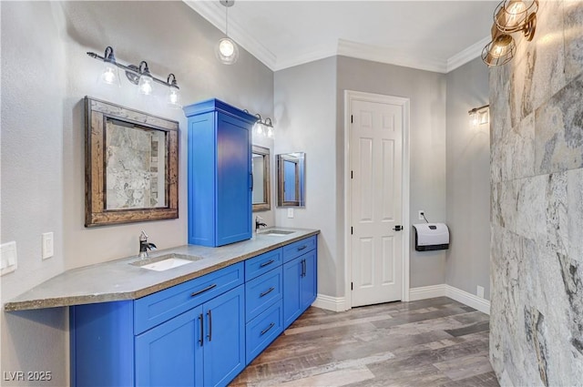5913 Audria Falls Ave, Las Vegas, NV 89131 - bathroom featuring double vanity, wood finished floors, and crown molding