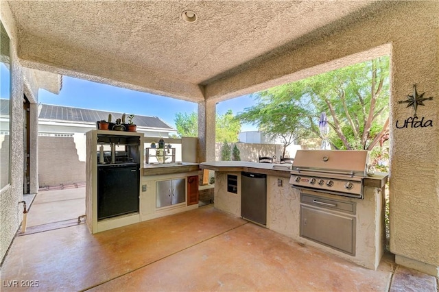 5913 Audria Falls Ave, Las Vegas, NV 89131 - view of patio featuring exterior kitchen