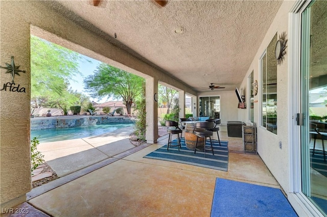 5913 Audria Falls Ave, Las Vegas, NV 89131 - view of patio with ceiling fan, an outdoor pool, and outdoor dining area