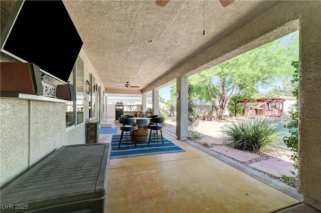 5913 Audria Falls Ave, Las Vegas, NV 89131 - view of patio / terrace with a ceiling fan and outdoor dining area