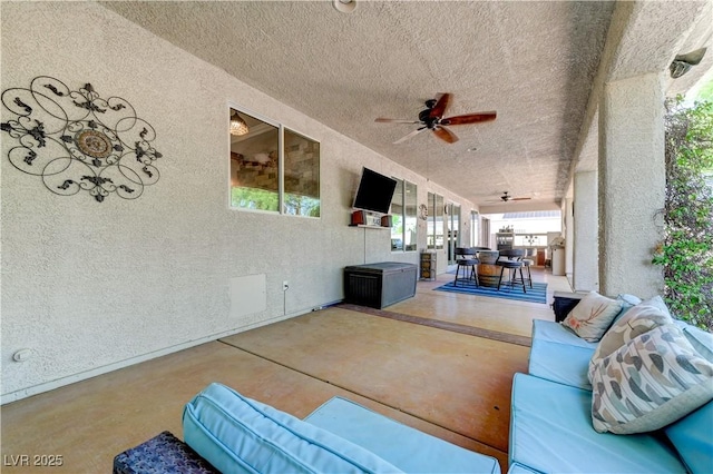 5913 Audria Falls Ave, Las Vegas, NV 89131 - view of patio with ceiling fan, outdoor dining space, and outdoor lounge area
