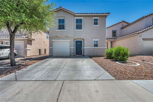 6377 W Haleh Ave, Las Vegas, NV 89141 - view of front facade with a tile roof, stucco siding, driveway, and an attached garage