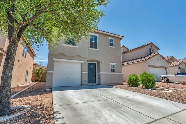 6377 W Haleh Ave, Las Vegas, NV 89141 - view of front of property featuring stucco siding, concrete driveway, a tiled roof, and an attached garage