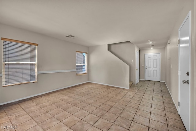 6377 W Haleh Ave, Las Vegas, NV 89141 - entrance foyer with light tile patterned floors and baseboards