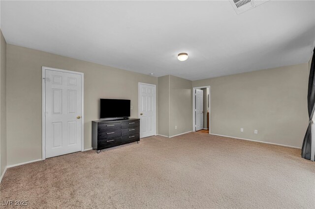 6377 W Haleh Ave, Las Vegas, NV 89141 - unfurnished living room with light colored carpet
