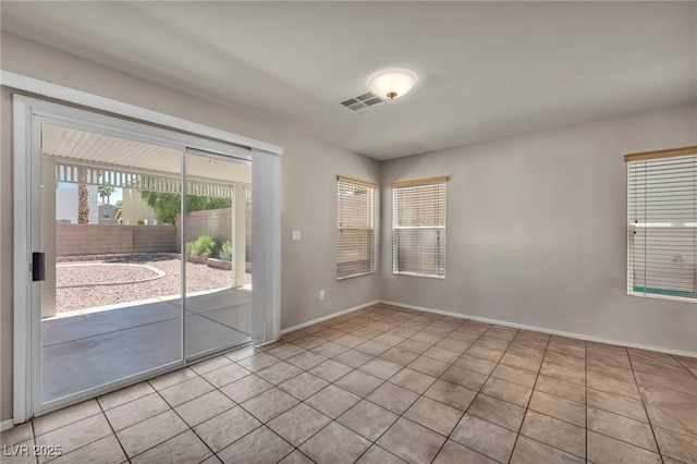 6377 W Haleh Ave, Las Vegas, NV 89141 - tiled empty room with baseboards