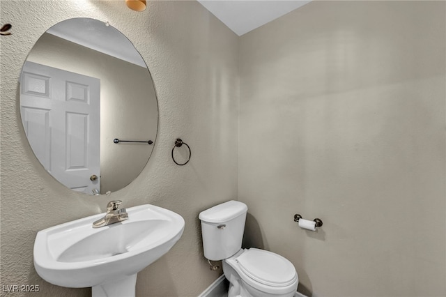 6377 W Haleh Ave, Las Vegas, NV 89141 - half bath with a sink and toilet