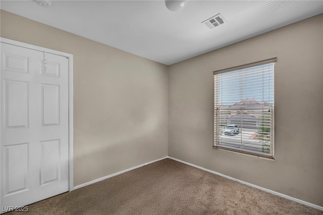 6377 W Haleh Ave, Las Vegas, NV 89141 - spare room featuring carpet flooring and baseboards