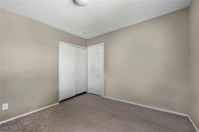 6377 W Haleh Ave, Las Vegas, NV 89141 - unfurnished bedroom featuring carpet floors and a closet