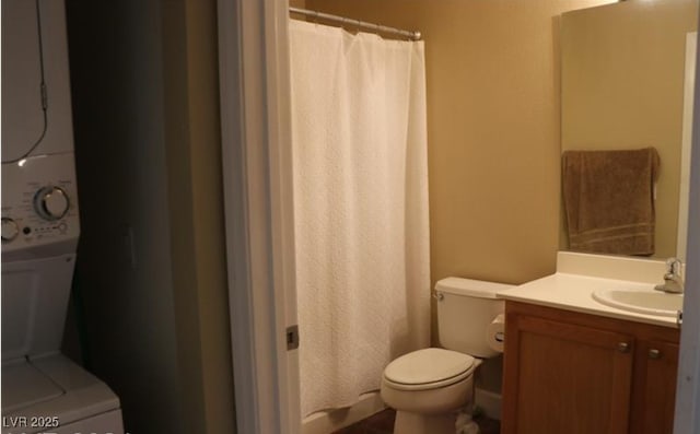 63 E Agate Ave Unit 202, Las Vegas, NV 89123 - full bath featuring estacked washer and dryer, vanity, and a shower with shower curtain