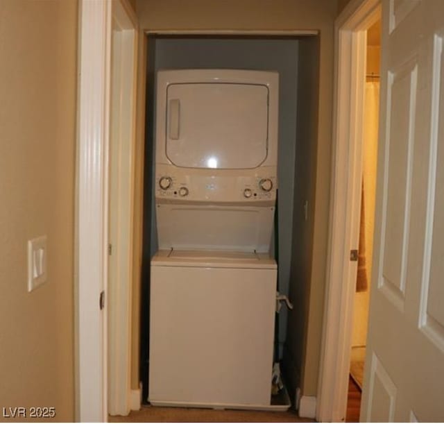 63 E Agate Ave Unit 202, Las Vegas, NV 89123 - laundry room featuring stacked washer / drying machine