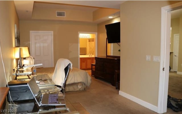 63 E Agate Ave Unit 202, Las Vegas, NV 89123 - bedroom with light colored carpet, a desk, and ensuite bathroom