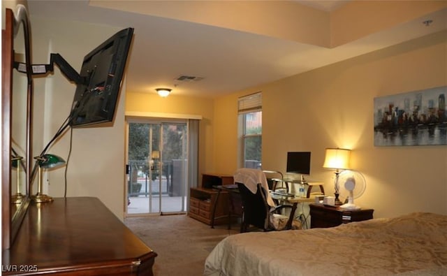63 E Agate Ave Unit 202, Las Vegas, NV 89123 - carpeted bedroom with access to exterior