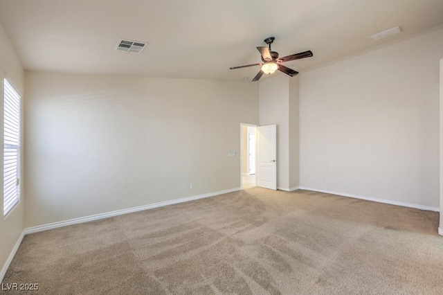 7998 Base Camp Ave, Las Vegas, NV 89178 - spare room featuring ceiling fan, carpet flooring, and vaulted ceiling