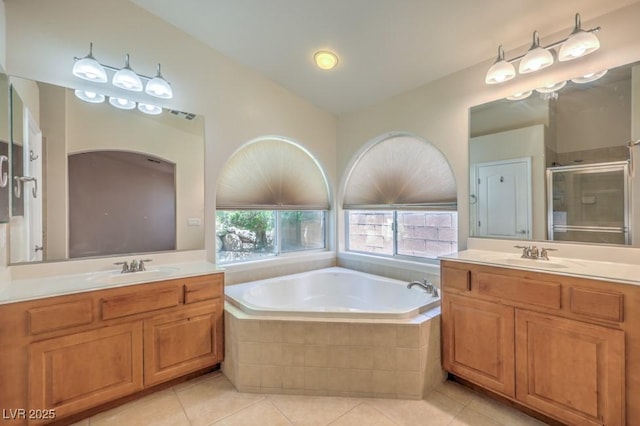 7998 Base Camp Ave, Las Vegas, NV 89178 - full bathroom featuring tile patterned floors, two vanities, a shower stall, and lofted ceiling