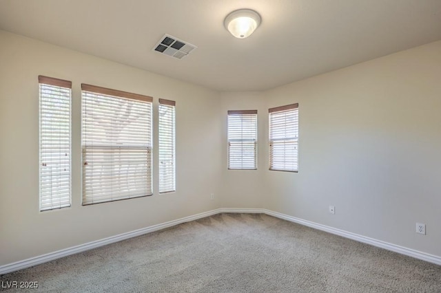 7998 Base Camp Ave, Las Vegas, NV 89178 - carpeted spare room featuring baseboards