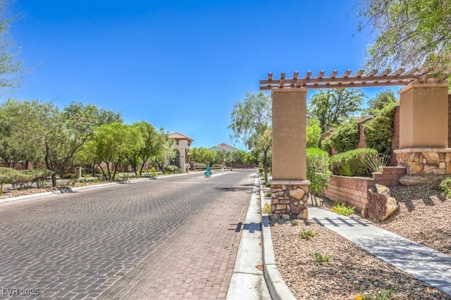 7998 Base Camp Ave, Las Vegas, NV 89178 - view of street featuring curbs and a gated entry