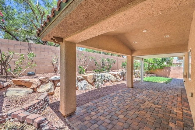 7998 Base Camp Ave, Las Vegas, NV 89178 - fenced backyard featuring a patio