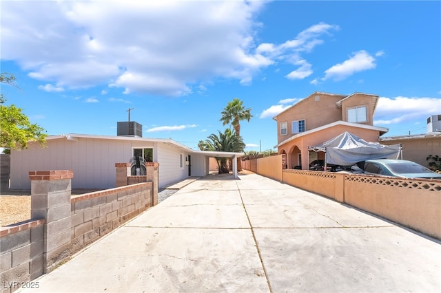 2749 Del Mar Pl, Las Vegas, NV 89169 - view of front facade with driveway and a carport