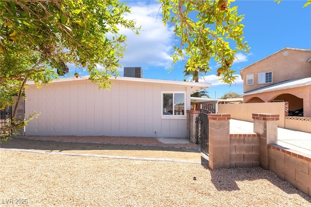 2749 Del Mar Pl, Las Vegas, NV 89169 - back of house with a gate
