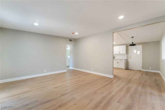 2749 Del Mar Pl, Las Vegas, NV 89169 - unfurnished room featuring light wood finished floors and recessed lighting
