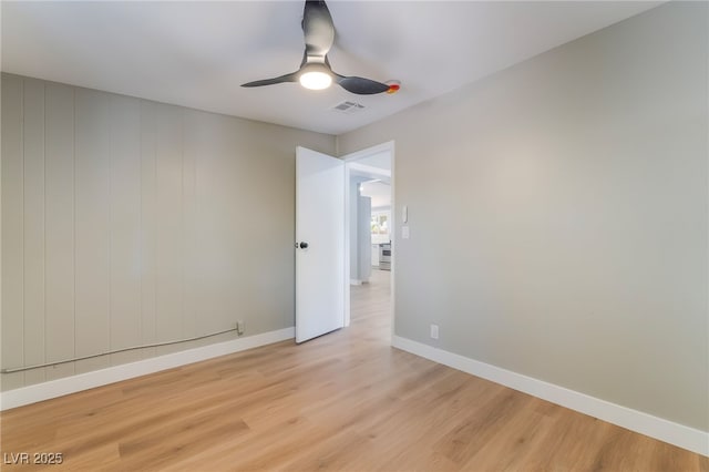 2749 Del Mar Pl, Las Vegas, NV 89169 - spare room with a ceiling fan and light wood-style floors