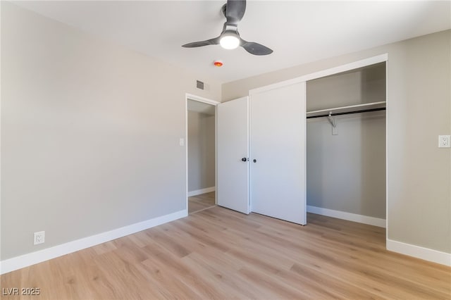 2749 Del Mar Pl, Las Vegas, NV 89169 - unfurnished bedroom with light wood-style floors, a closet, and a ceiling fan