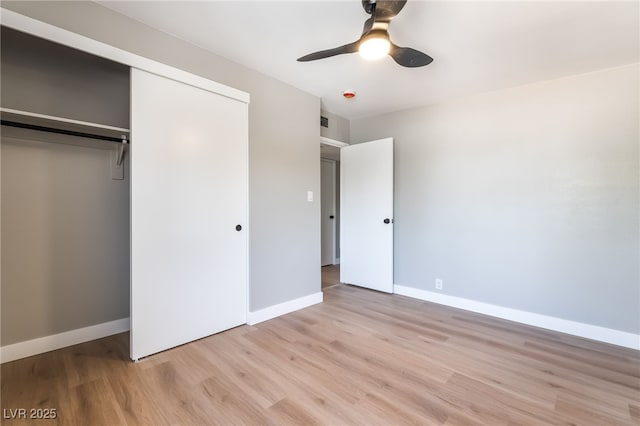 2749 Del Mar Pl, Las Vegas, NV 89169 - unfurnished bedroom with light wood-style flooring, a closet, and ceiling fan
