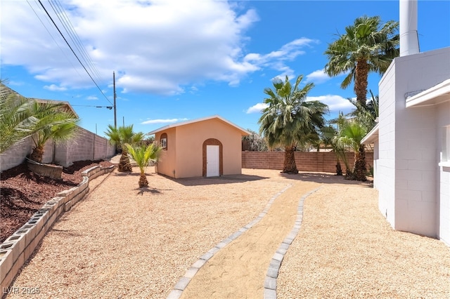 2749 Del Mar Pl, Las Vegas, NV 89169 - fenced backyard with a storage unit