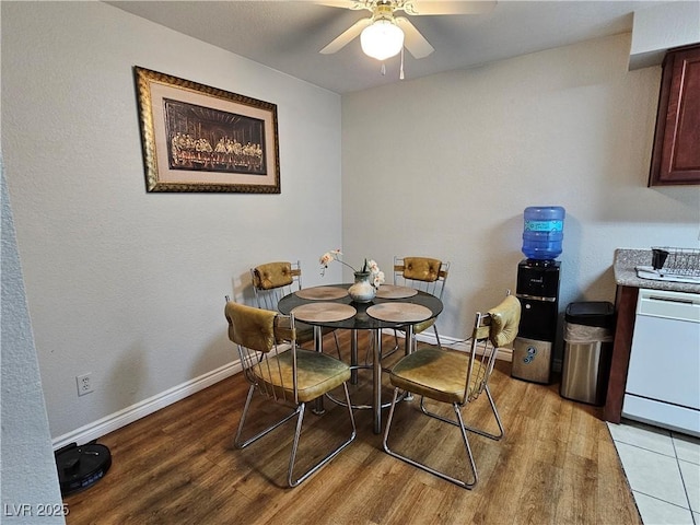 2451 N Rainbow Blvd Unit 1123, Las Vegas, NV 89108 - dining room with light wood-style flooring and a ceiling fan