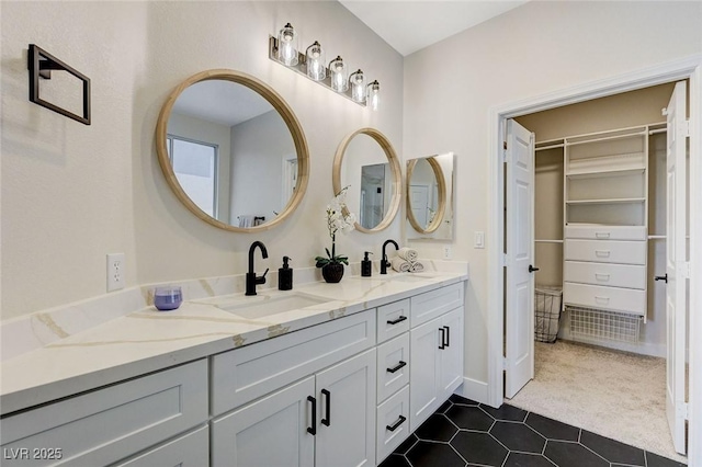 9632 Cherry Canyon Ave, Las Vegas, NV 89129 - full bath with double vanity, tile patterned flooring, and a spacious closet