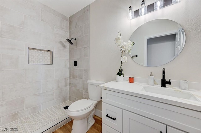 9632 Cherry Canyon Ave, Las Vegas, NV 89129 - full bathroom featuring wood finished floors, vanity, and a tile shower