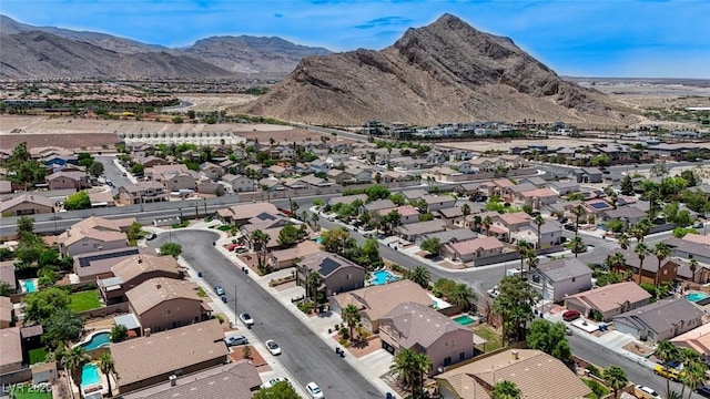 9632 Cherry Canyon Ave, Las Vegas, NV 89129 - aerial view of property and surrounding area featuring nearby suburban area and a mountain backdrop