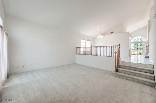 2728 Aspen Wood Ave, Henderson, NV 89074 - carpeted spare room featuring a chandelier and high vaulted ceiling