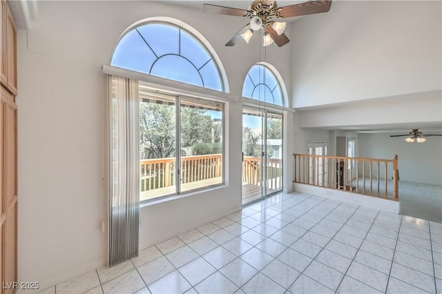 2728 Aspen Wood Ave, Henderson, NV 89074 - spare room featuring ceiling fan, healthy amount of natural light, and light tile patterned flooring