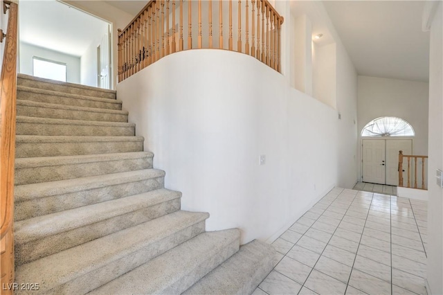 2728 Aspen Wood Ave, Henderson, NV 89074 - stairs featuring a high ceiling and tile patterned floors